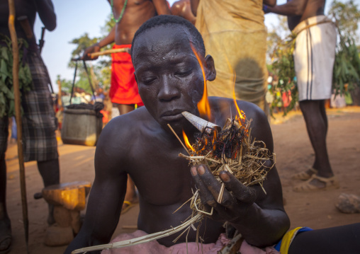 Majang Tribe Man Smoking For A Celebration, Kobown, Ethiopia