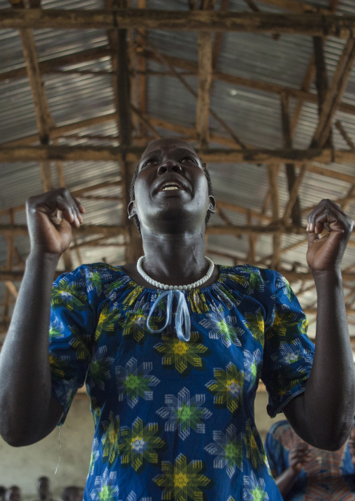 Woman Praying During Catholic Sunday Church Service, Gambela, Ethiopia