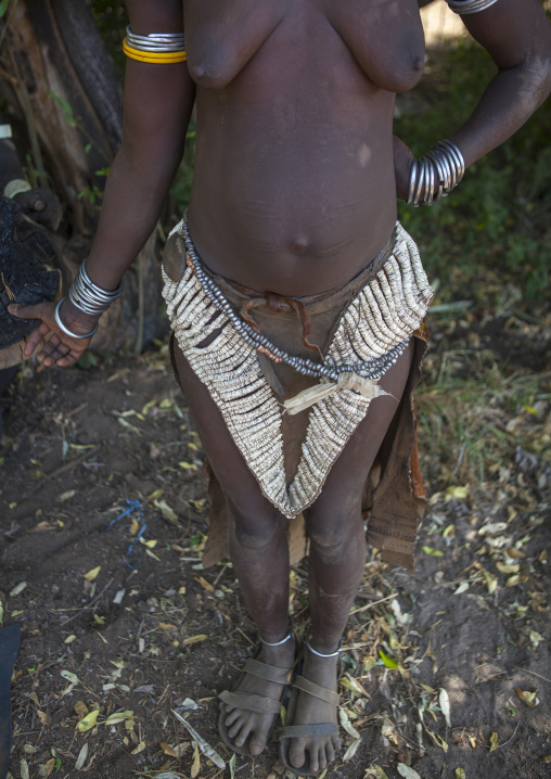 Topossa Woman, With Traditional Skirt Made With Ostrich Eggs, Omo Valley, Kangate, Ethiopia