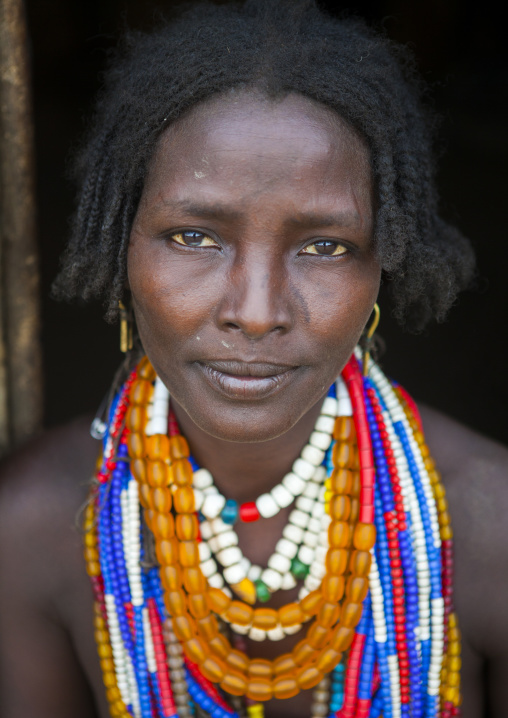 Portrait Of Beautiful Erbore Tribe Woman Wearing Beaded Necklace,  Omo Valley, Ethiopia