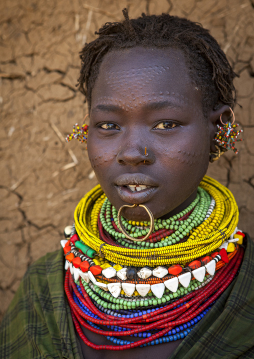 Portrait Of A Topossa Woman, With Traditional Clothes, Omo Valley, Kangate, Ethiopia