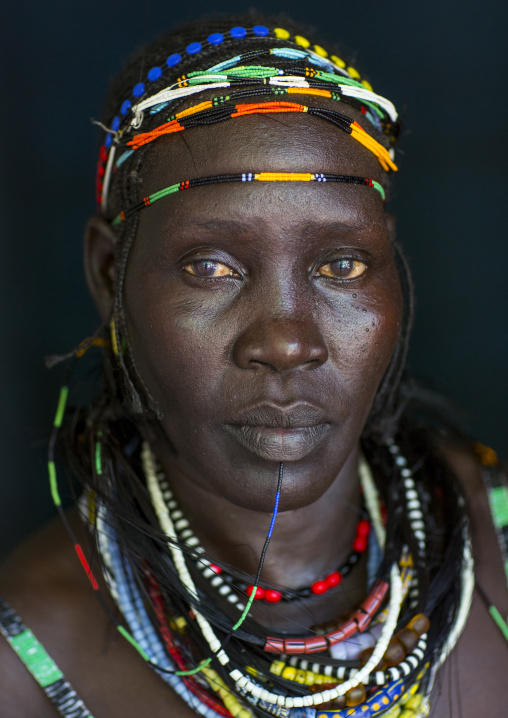 Woman From Anuak Tribe In Traditional Clothing, Gambela, Ethiopia