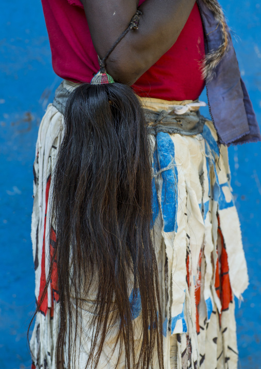 Man From Anuak Tribe In Traditional Clothing Holding A Flyswatter, Gambela, Ethiopia