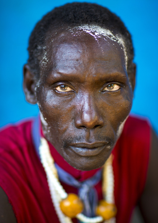 Man From Anuak Tribe In Traditional Clothing Wearing An Amber Necklace, Gambela, Ethiopia