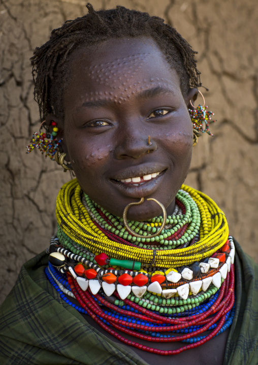 Portrait Of A Topossa Woman, With Traditional Clothes, Omo Valley, Kangate, Ethiopia