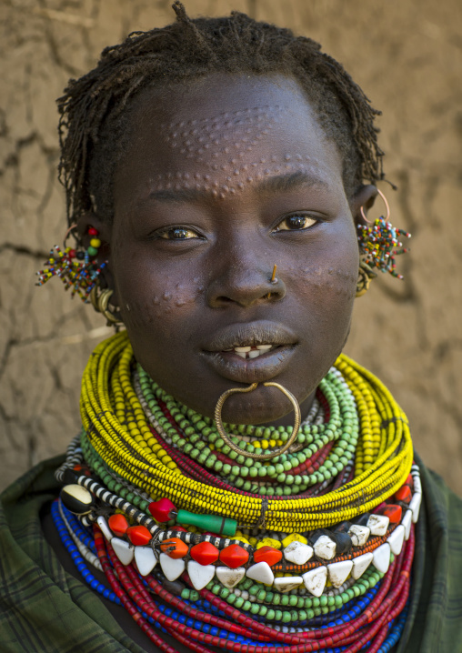 Portrait Of A Topossa Woman, With Traditional Clothes, Omo Valley, Kangate, Ethiopia