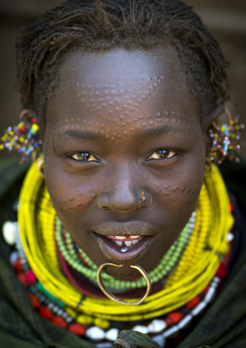 Portrait Of A Topossa Woman, With Traditional Clothes, Omo Valley, Kangate, Ethiopia