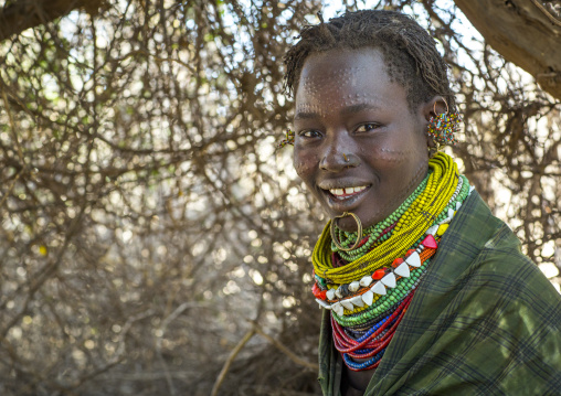 Portrait Of A Topossa Woman, With Traditional Clothes, Omo Valley, Kangate, Ethiopia