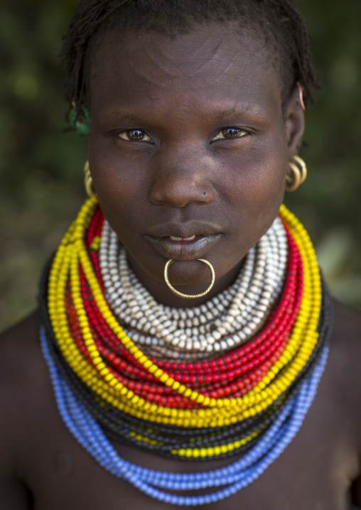 Portrait Of A Topossa Woman, With Traditional Clothes, Omo Valley, Kangate, Ethiopia