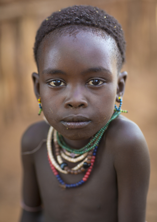 Litte Hamer Girl Tribe In Traditional Outfit, Turmi, Omo Valley, Ethiopia