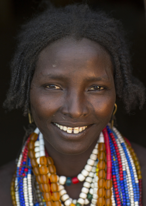 Portrait Of Beautiful Erbore Tribe Woman Wearing Beaded Necklace,  Omo Valley, Ethiopia