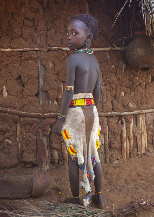 Litte Hamer Girl Tribe In Traditional Outfit, Turmi, Omo Valley, Ethiopia