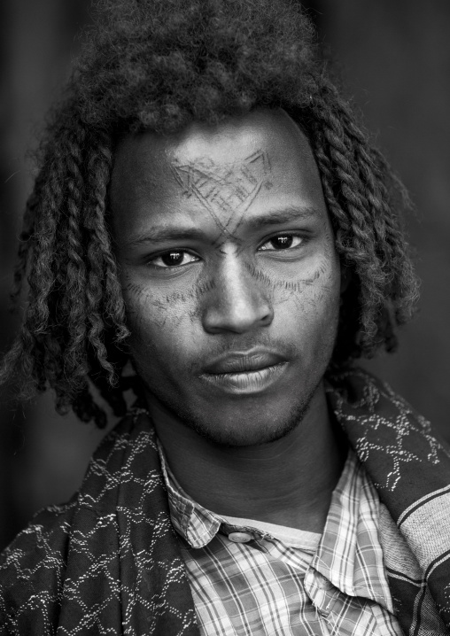 Afar Tribe Man With Curly Hair And Facial Tattoos, Assayta, Ethiopia