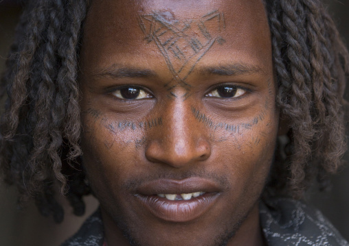 Afar Tribe Man With Curly Hair And Facial Tattoos, Assayta, Ethiopia