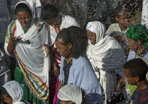 Holy Water Sprayed Onto The Crowd Attending Timkat Celebrations Of Epiphany, Lalibela, Ethiopia