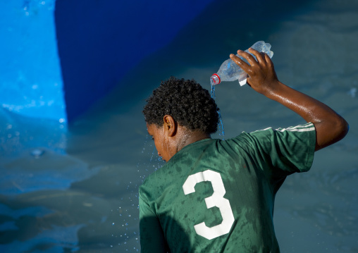 Holy Water Sprayed Onto The Crowd Attending Timkat Celebrations Of Epiphany, Lalibela, Ethiopia