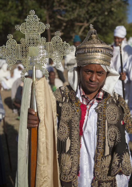 Ethiopian Orthodox Priest Holding A Cross During The Colorful Timkat Epiphany Festival, Lalibela, Ethiopia