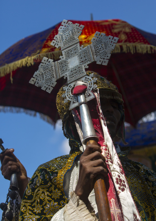 Ethiopian Orthodox Priest Holding A Cross During The Colorful Timkat Epiphany Festival, Lalibela, Ethiopia