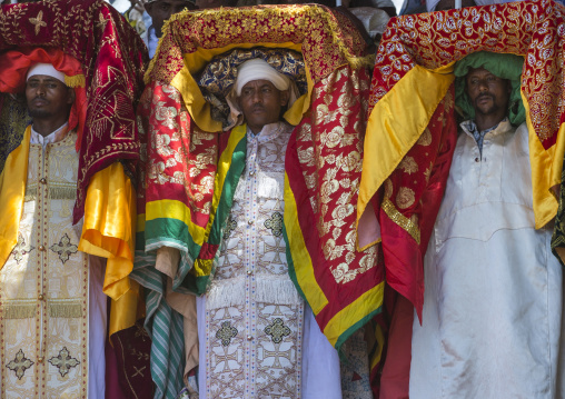 Priests Carrying Some Covered Tabots On Their Heads During Timkat Epiphany Festival, Lalibela, Ethiopia