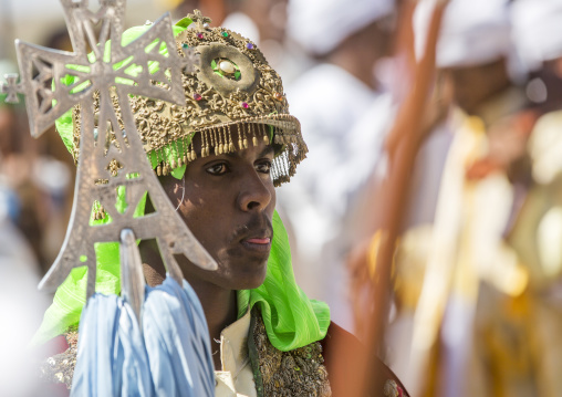 Ethiopian Orthodox Priest Holding A Cross During The Colorful Timkat Epiphany Festival, Lalibela, Ethiopia