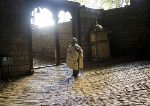 Priest Inside Yemrehana Krestos Rock Church, Lalibela, Ethiopia