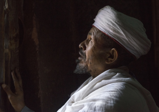 Orthodox Priest Inside A Rock Church, Lalibela, Ethiopia