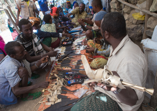 Afar tribe men making traditional knife called guile, Oromo, Sambate, Ethiopia