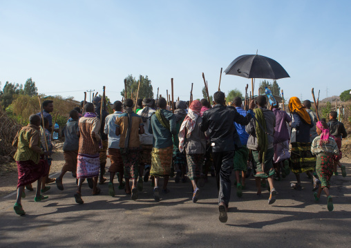 Oromo groom with an umbrella during his wedding celebration, Oromo, Sambate, Ethiopia