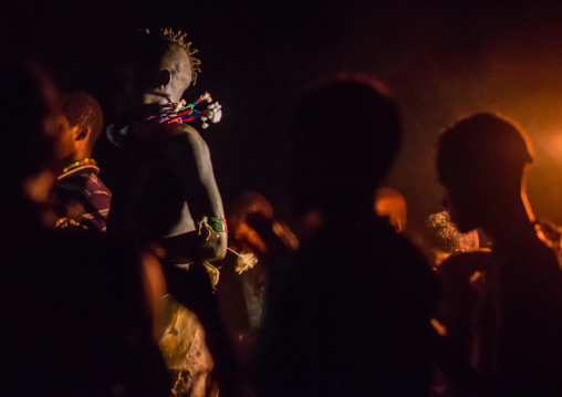 Hamer tribe teenage boys dancing at night, Omo valley, Turmi, Ethiopia