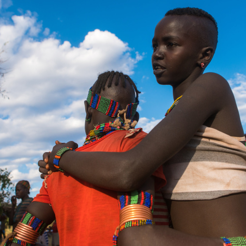 Hamer tribe teenage girls attending a bull jumping ceremony, Omo valley, Turmi, Ethiopia