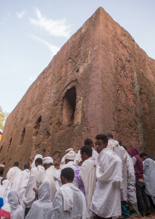 Pilgrims in front of a rock church during kidane mehret orthodox celebration, Amhara region, Lalibela, Ethiopia