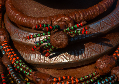 Hamer tribe teenage girl with a goat skin necklace that shows she is already engaged for a marriage, Omo valley, Turmi, Ethiopia