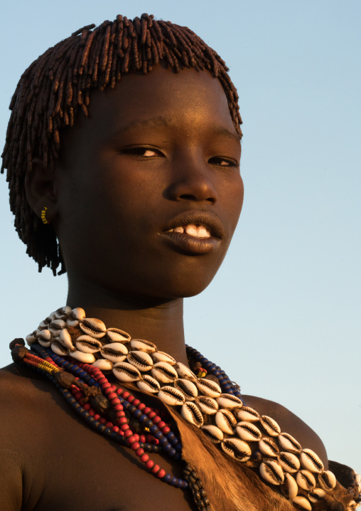 Portrait of a hamer tribe teenage girl, Omo valley, Turmi, Ethiopia