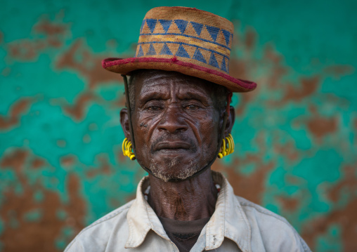 Portrait of a hamer tribe man with a hat, Omo valley, Turmi, Ethiopia