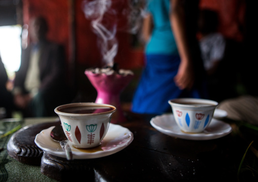 Ethiopian traditional coffee ceremony with incense burning on charcoal, Semien wollo zone, Woldia, Ethiopia