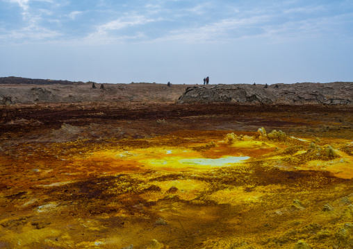 Tourists in the colorful volcanic landscape of dallol in the danakil depression, Afar region, Dallol, Ethiopia