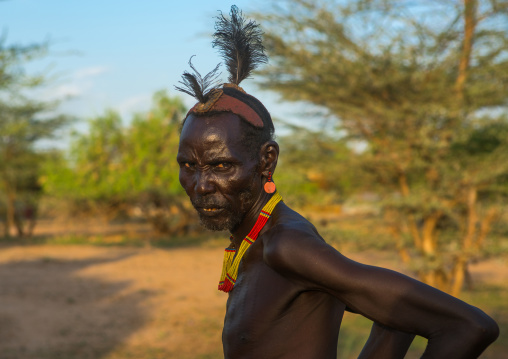 Dassanech elder during dimi ceremony to celebrate circumcision of the teenagers, Omo valley, Omorate, Ethiopia