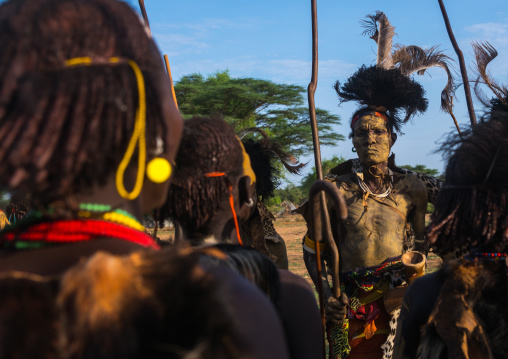 Dassanech men and women during dimi ceremony to celebrate circumcision of teenagers, Omo valley, Omorate, Ethiopia