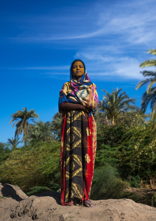 Afar tribe teenage girl with qasil on her face, Afar region, Afambo, Ethiopia