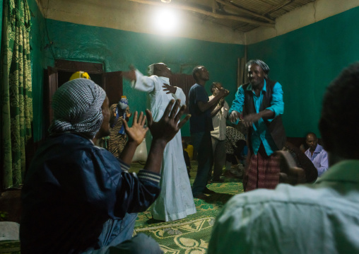 Sufi people go into a trance during a ceremony, Harari region, Harar, Ethiopia