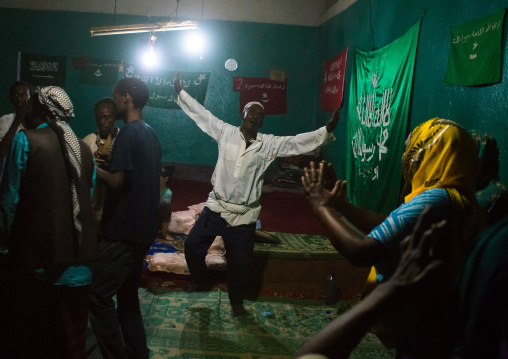 Sufi people go into a trance during a ceremony, Harari region, Harar, Ethiopia