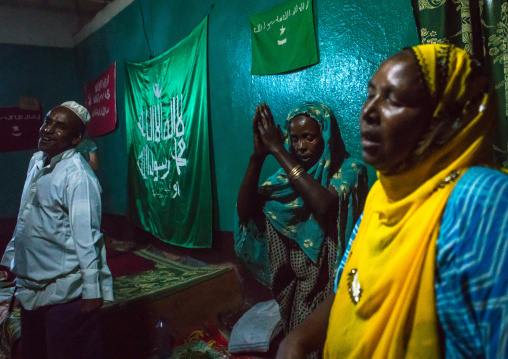 Sufi people go into a trance during a ceremony, Harari region, Harar, Ethiopia