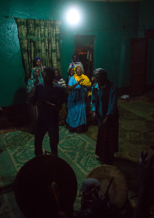 Sufi people go into a trance during a ceremony, Harari region, Harar, Ethiopia