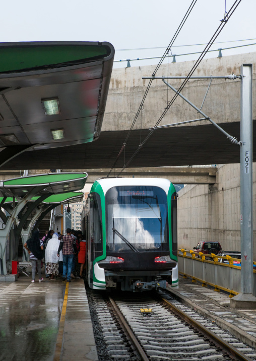 People going inside train of ethiopian railways constructed by china, Addis abeba region, Addis ababa, Ethiopia