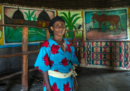 Ethiopia, Kembata, Alaba Kuito, ethiopian woman inside her traditional painted and decorated house