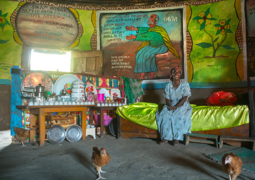 Ethiopia, Kembata, Alaba Kuito, ethiopian woman inside her traditional painted and decorated house