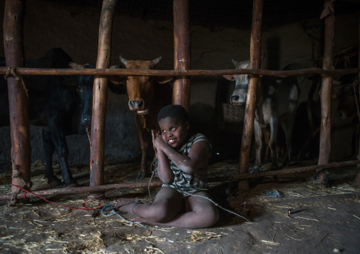 Physically and mentally handicapped child chained to a fence in a house, Kembata, Alaba kuito, Ethiopia