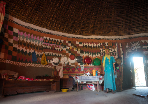 Ethiopia, Kembata, Alaba Kuito, ethiopian woman inside her traditional painted and decorated house