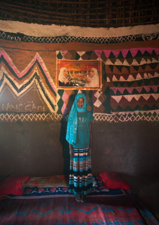 Ethiopia, Kembata, Alaba Kuito, ethiopian muslim girl inside her traditional painted and decorated house