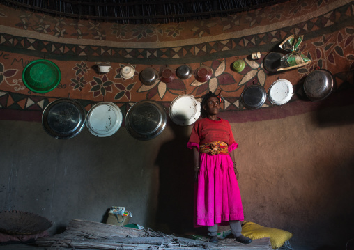 Ethiopia, Kembata, Alaba Kuito, ethiopian woman inside her traditional painted and decorated house